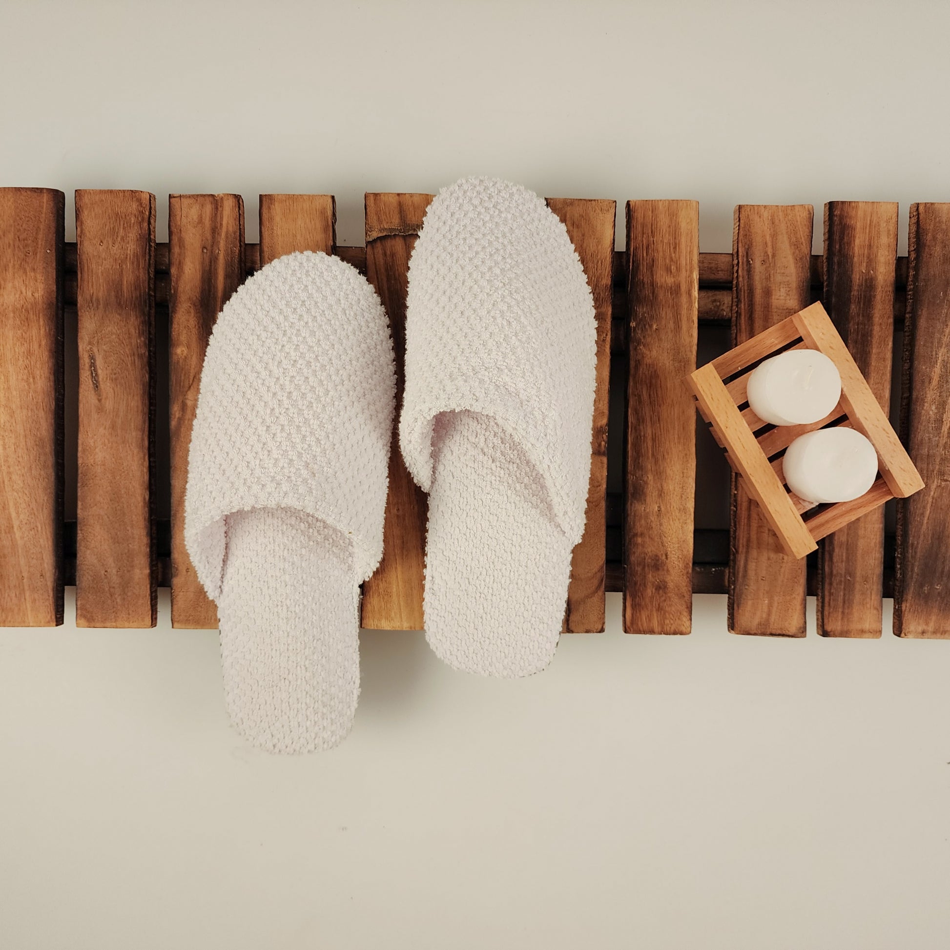 White Hawaii anti-slip slippers designed for comfort and safety, featuring a durable, non-slip sole, perfect for indoor use.