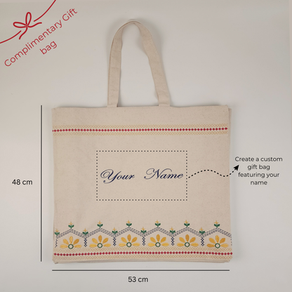 100% organic cotton tote bag with visible cotton seeds, free from chemicals. Featuring detailed embroidery, this eco-friendly bag offers a natural, sustainable choice for everyday use while highlighting a raw, earthy aesthetic.