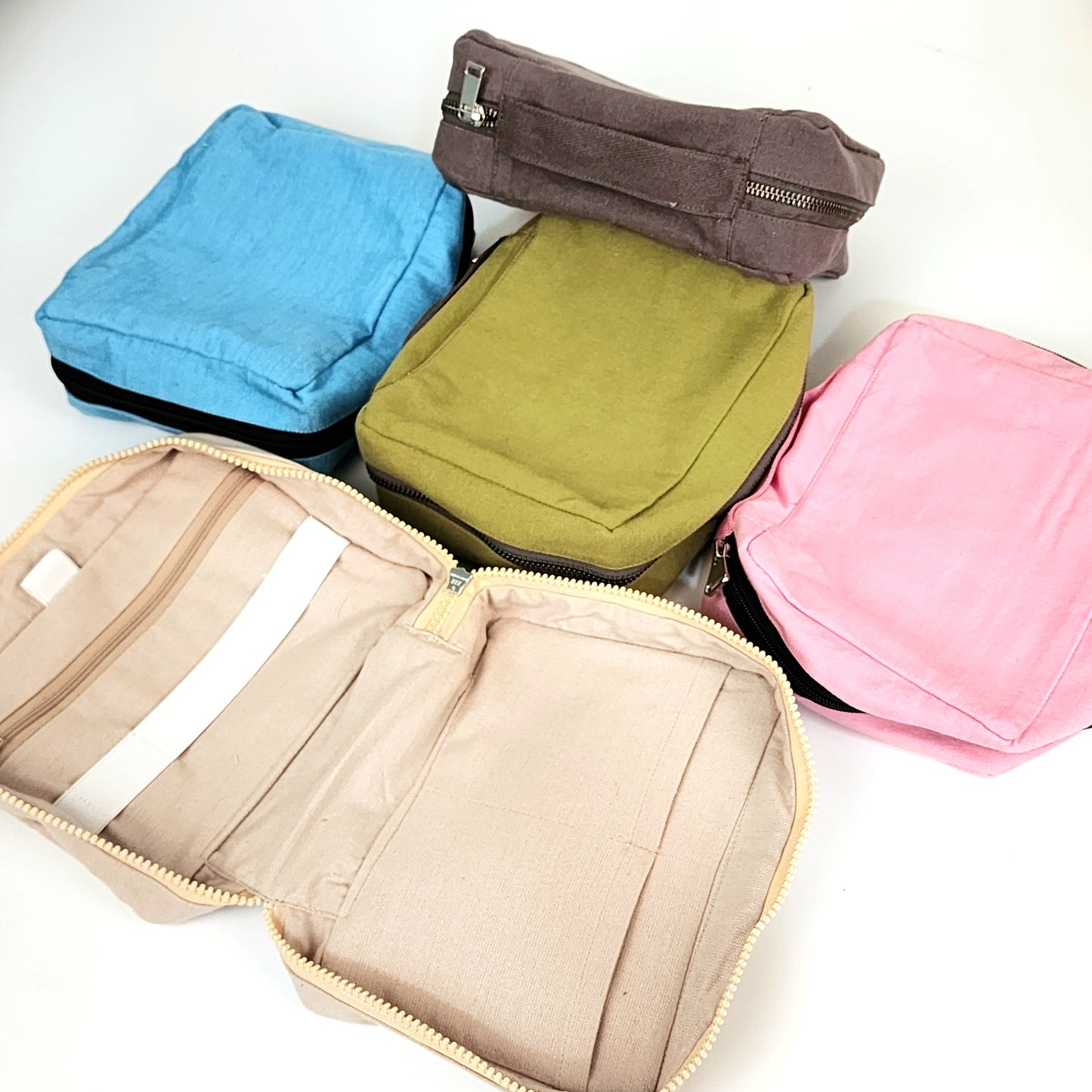 pouch, bag, 100% cotton , compartments , sections , zips , chain , inside zip , tarvel bag , college bag , office bag , multi color , spacious , minimalistic , colorful , everyday use , fabric bag, handmade , hand loom , inside zipper , pocket inside, handle , solid color, space , durable , for rough use 