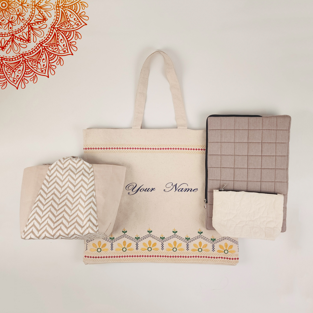 Gift set including a stylish lunch bag, laptop sleeve, cosmetic pouch, and a customized or personalized tote bag. Perfect for everyday use or gifting, with a variety of options to suit different styles. Ideal for work, travel, or as a thoughtful personalized present.